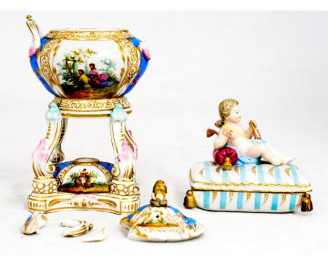 *A Berlin porcelain pastille burner, twin handled ovoid form supported on four dolphin scroll legs, together with a Meissen s