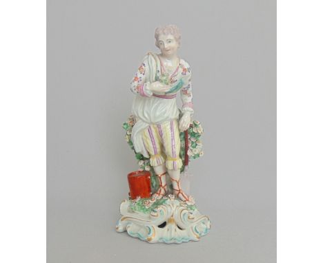 A Derby figure of Earth, one of the Elements, circa 1765, patch marks, height 24cm
Condition: Losses to leaves, watering can 