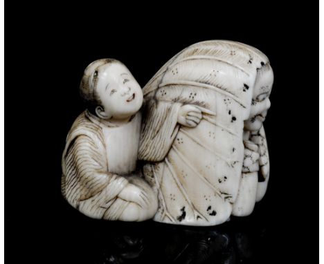 An Oriental ivory netsuke, carved as an elderly lady under a large leaf with a boy beside, signed, height 3cm