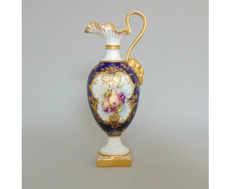 A Royal Worcester ewer with a cobalt blue ground and gilding, painted with fruit, signed by Hawkins, circa date code for 1900