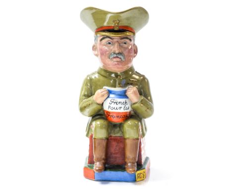 A rare WWI Wilkinson Pottery toby jug in the form of General French, designed by Carruthers Gould, modelled seated holding a 