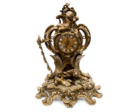 *A 19th Century cast brass bracket clock, circa 1880, Rococo Revival design, mounted with cherubs and a goat amongst elaborat