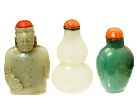 Three Chinese jade snuff bottles, one of double gourd form, another modelled as a Mandarin (3)