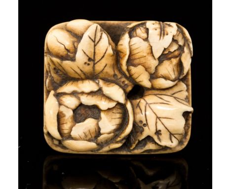 An oriental carved ivory netsuke, carved as a basket of flowers, width 3cm