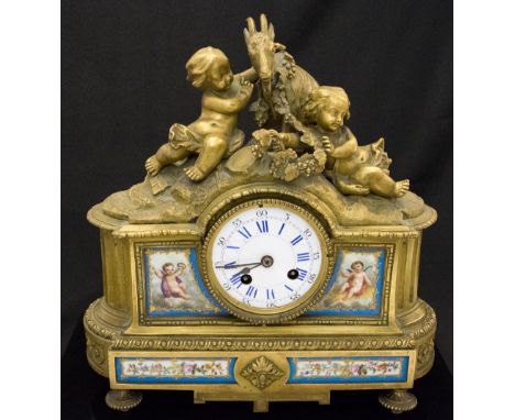 A 19th Century French gilt metal bracket clock, circa 1870, Baroque design case surmounted with two cherubs draping vines ove