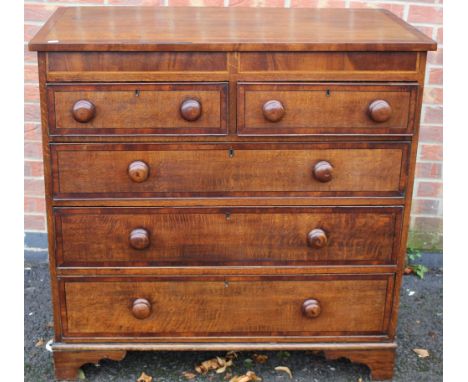 A George III oak chest of drawers, circa 1800, fitted with two short over three long graduated drawers, all retaining origina