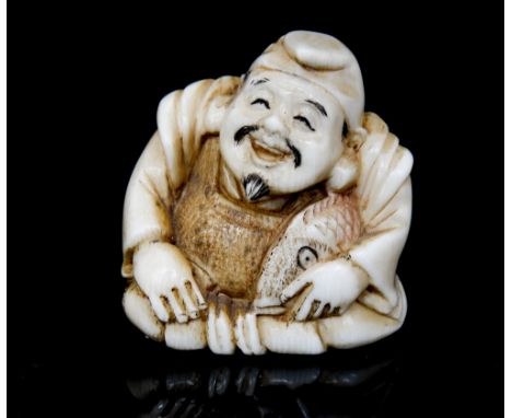 An Oriental ivory netsuke, carved as a smiling fisherman with a large carp, signed, height 4cm