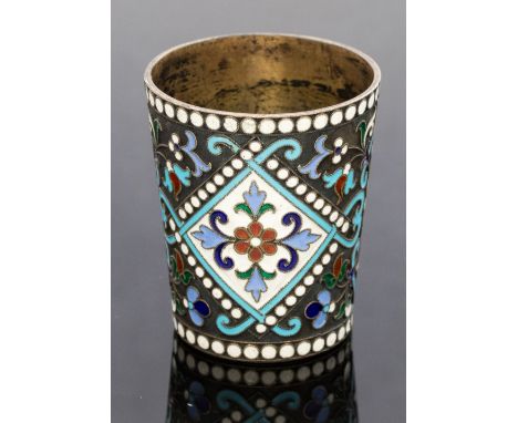 A Russian silver gilt and cloisonne enamel tot, of beaker form, first Kokoshnick mark, circa 1896-1908, maker Vasily Andreyev