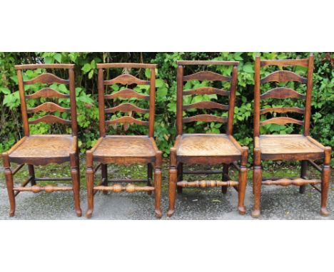 Four George III oak and ash ladder back chairs, circa 1800, comprising matching pair and two further chairs, all probably att