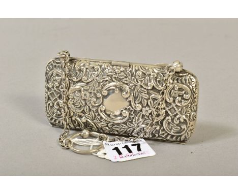AN EDWARDIAN SILVER RECTANGULAR PURSE, foliate scroll repousse decorated with vacant cartouches back and front, on short chai