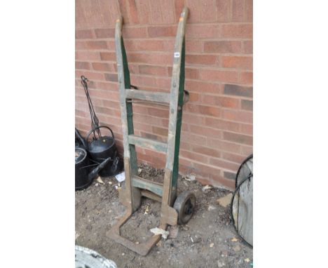 A VINTAGE WOOD AND CAST IRON SACK TRUCK, height 127cm