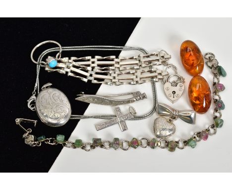 A SELECTION OF ITEMS to include a pair of earrings each designed with an oval cabochon amber with non pierced fittings, a gat