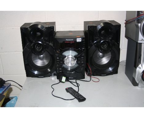 A PANASONIC SA-AKX38 HI FI with two speakers, remote, FM radio, MP3 CD player and USB inputs (PAT pass and working)