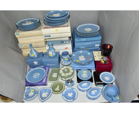 A COLLECTION OF WEDGWOOD JASPERWARE, in pale blue and green, including twenty two Christmas plates, 1977-81, 1983, 1987-2002 