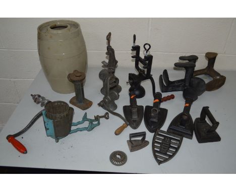A QUANTITY OF VARIOUS VINTAGE METALWARE, to include four various irons, food mincers, three shoe lasts, etc, together with a 