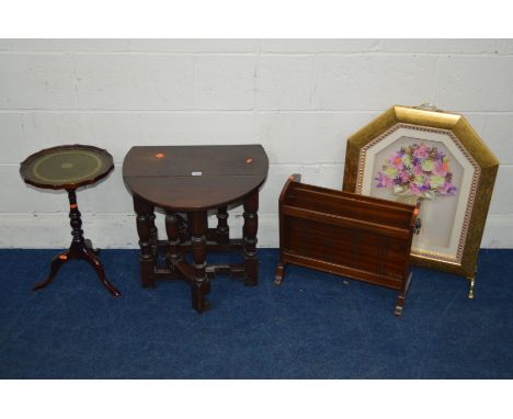 A REPRODUCTION OAK DROP LEAF OCCASIONAL TABLE, together with a wine table, magazine rack and a firescreen (4)