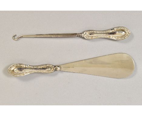 A GEORGE V SILVER HANDLED BUTTON HOOK AND MATCHING SHOE HORN, makers James Deakin &amp; Sons, Chester 1917 (2)