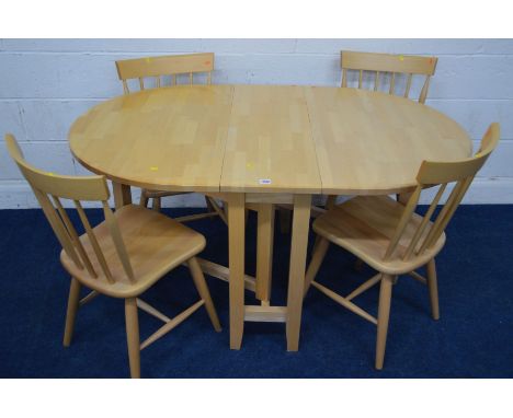 A MODERN BEECH OVAL GATE LEG TABLE, width 146cm x closed 37cm x depth 92cm x height 75cm and four spindle back chairs (5)