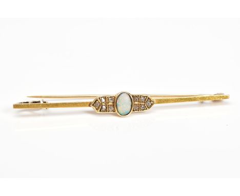 AN OPAL AND DIAMOND BAR BROOCH, set with a central oval opal flanked with diamond set panels, to a plain polished bar, length