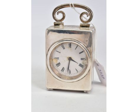 A SILVER DREW AND SONS CARRIAGE CLOCK, the white clock face with Roman numerals set within a plain polished silver case, a hi