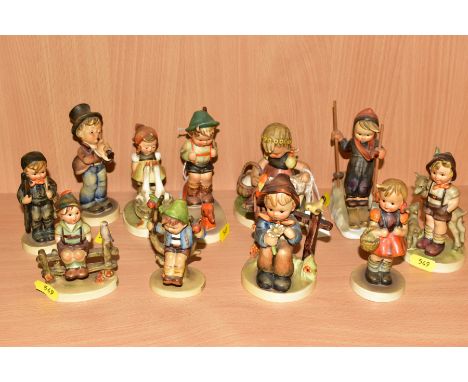 A GROUP OF ELEVEN HUMMEL FIGURES to include 'Chimney Sweep 12', 'Sensitive Hunter' 6/0, 'Goose Girl 47', 3/0, 'Skier 59', 'Sc