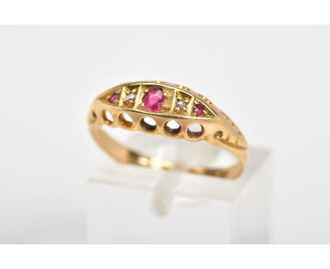 AN 18CT GOLD EARLY 20TH CENTURY BOAT RING, set with circular cut rubies interspaced with diamonds, to the detailed shoulders 