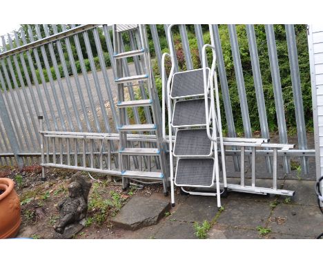 AN ALUMINIUM EXTENSION LADDER with eleven rungs, 309cm each section and a wide foot and two step ladders (3)