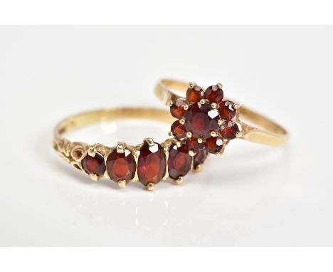 TWO 9CT GOLD GARNET SET RINGS, the first of cluster design to the tapered shoulders, ring size S, with a 9ct hallmark for Edi