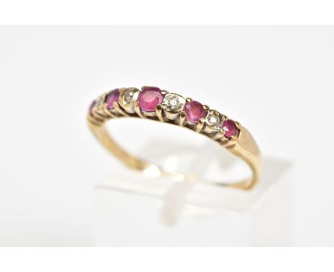 A 9CT GOLD RUBY AND DIAMOND RING, designed as a row of circular cut rubies interspaced by melee diamonds, with a 9ct hallmark