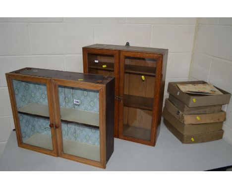 TWO OAK GLAZED DOUBLE DOOR HANGING CABINETS together with five various vintage boxed 78's records (7)