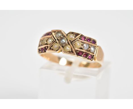 A VICTORIAN RUBY AND PEARL RING, panel design set with split pearls and rubies, inscription on reverse, with a plain polished