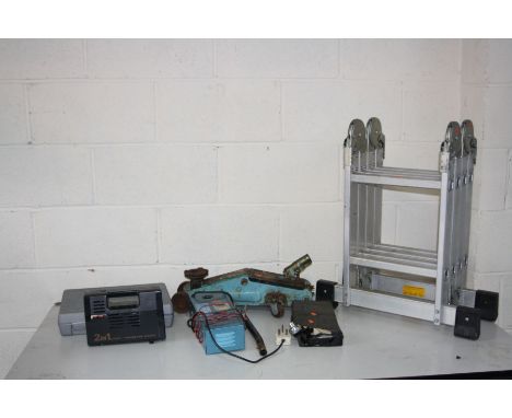 AN ALUMINIUM FOLDING PLATFORM LADDER, a Toplonk cordless drill, a trolley jack, a vintage Selmar battery charger (PAT fail du