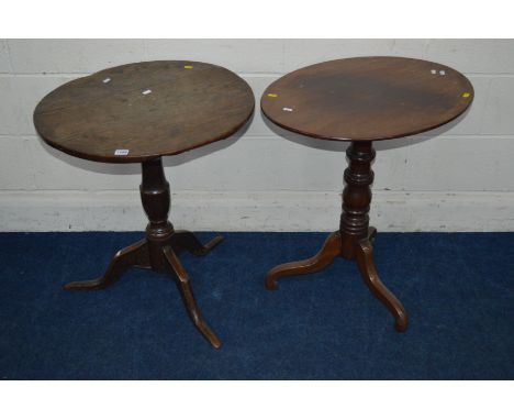 A GEORGIAN MAHOGANY OVAL TOPPED TRIPOD TABLE and a Georgian oak tripod table (2)