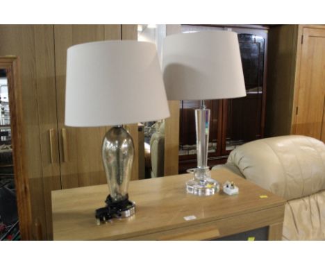 Two table lamp, one a faceted glass table lamp with cream shade