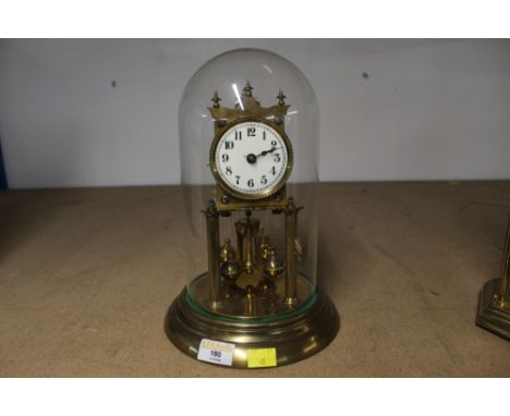 Early 20th century glass domed perpetual mantle clock