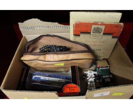 Vintage maps, diecast vehicles and travel iron