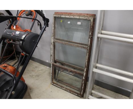 Two vintage metal windows