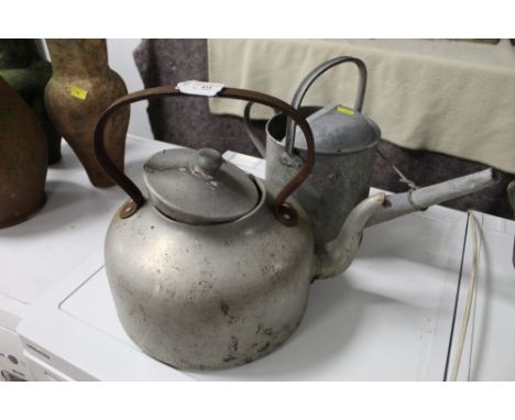 Galvanised vintage watering can and a large alloy teapot