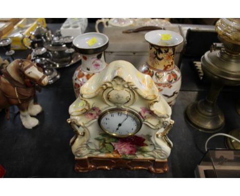 Two vases and an Victorian ceramic mantle clock