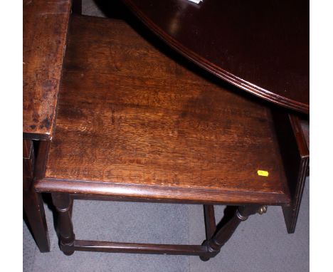 A late 19th century fruitwood ladder back side chair with rush envelope seat, on turned and stretchered supports, and an oak 