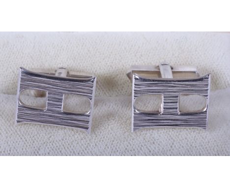 A pair of Gerald Benney silver cufflinks with textured finish, London 1978, in original fitted box