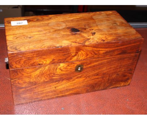 A 19th century rosewood tea caddy together with a set of turned ivory chequers, various dominoes and chess pieces, etc