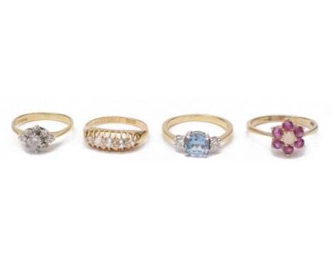 A five stone diamond set gypsy ring and three later ringsthe gypsy ring marked for 18ct gold, together with a contemporary 18