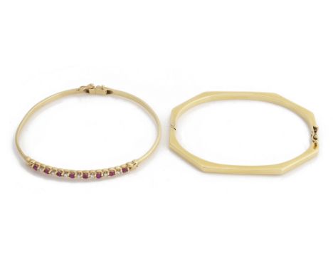A delicate ruby and diamond set bangle and another banglethe ruby and diamond bangle double hinged, mount marked for 9ct gold