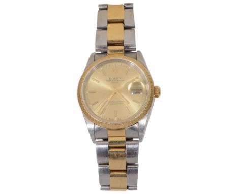 A Gentleman's Rolex Oyster Perpetual Date wristwatchwith champagne dial marked superlative chronometer, baton numerals, calen