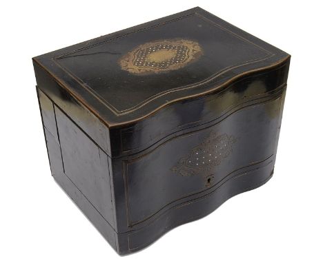 A 19th century French ebonised brass and mother of pearl inlaid decanter box,containing a mirror glass to the back and a lift