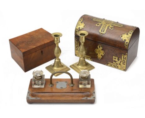 A Victorian domed burr walnut cut brass mounted tea caddy, an Edwardian oak desk stand, an early 19th century mahogany tea ca