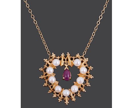 A 14K gold pearl and ruby heart shaped pendantthe heart shape pendant mounted with pearls and centre drop ruby cabouchon, sta