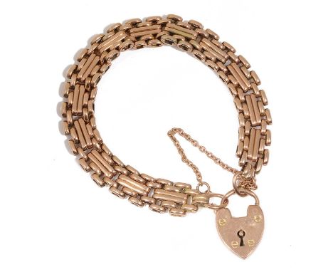 An early 20th century fancy link 9ct gold gate bracelethaving 9ct gold stamped heart fastening padlockapprox. 15.8g., approx.