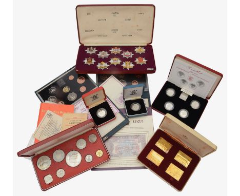 A collection of mostly silver and other proof coins and a set of London Fire Brigade Historic Badgescomprising Royal Mint: 19